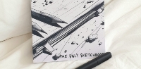 Top view of the Ugly sketchbook cover